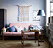 Livingroom with pink sofa, blue pinted walls and macramé. Scandinavian interior styling ideas and inspiration.