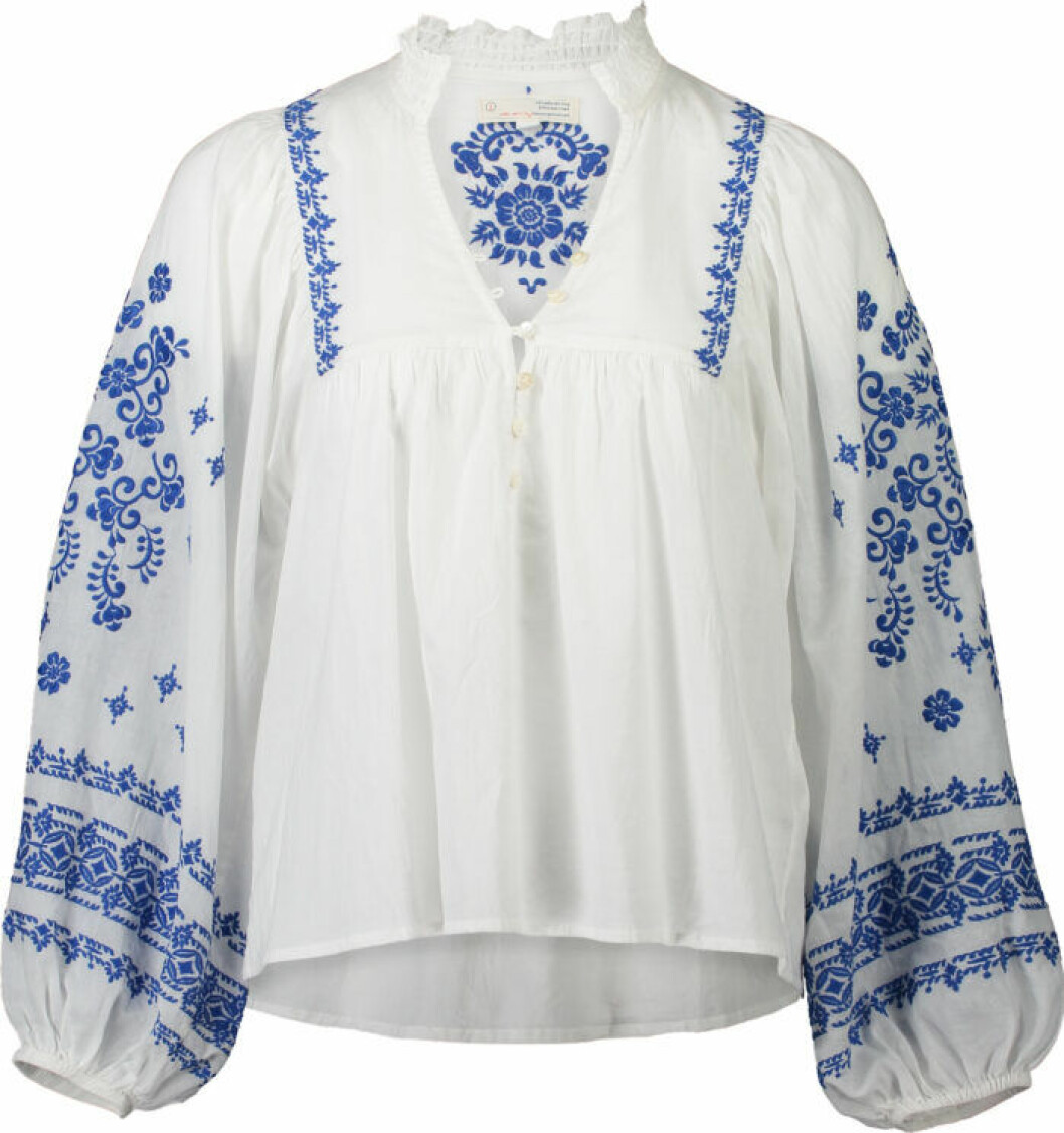 Blus med lång ärm och brodyr