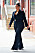 Ashley Graham i figursmickrande svart kostym