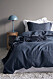 Sovrum med blå påslakan från Ellos Home