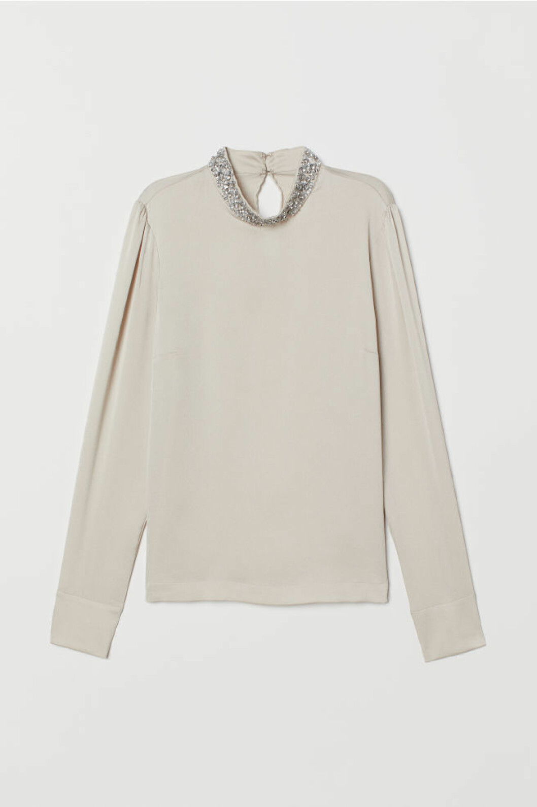 Blus med glitterkrage