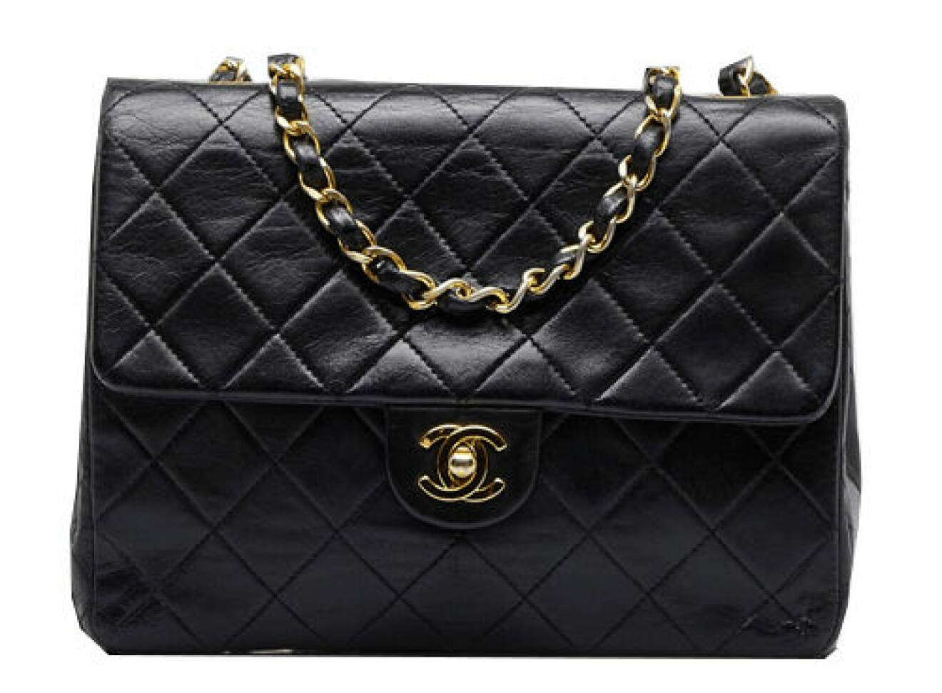 Svart quiltad skinnväska Single Flap Bag med guldkedja från Chanel