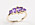 Guldfärgad ring med lila stenar i olika former. Ring från Cornelia Webb.