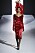 Röd draperad satinklänning på catwalken för hösten och vintern 2023 hos Dolce &amp; Gabbana