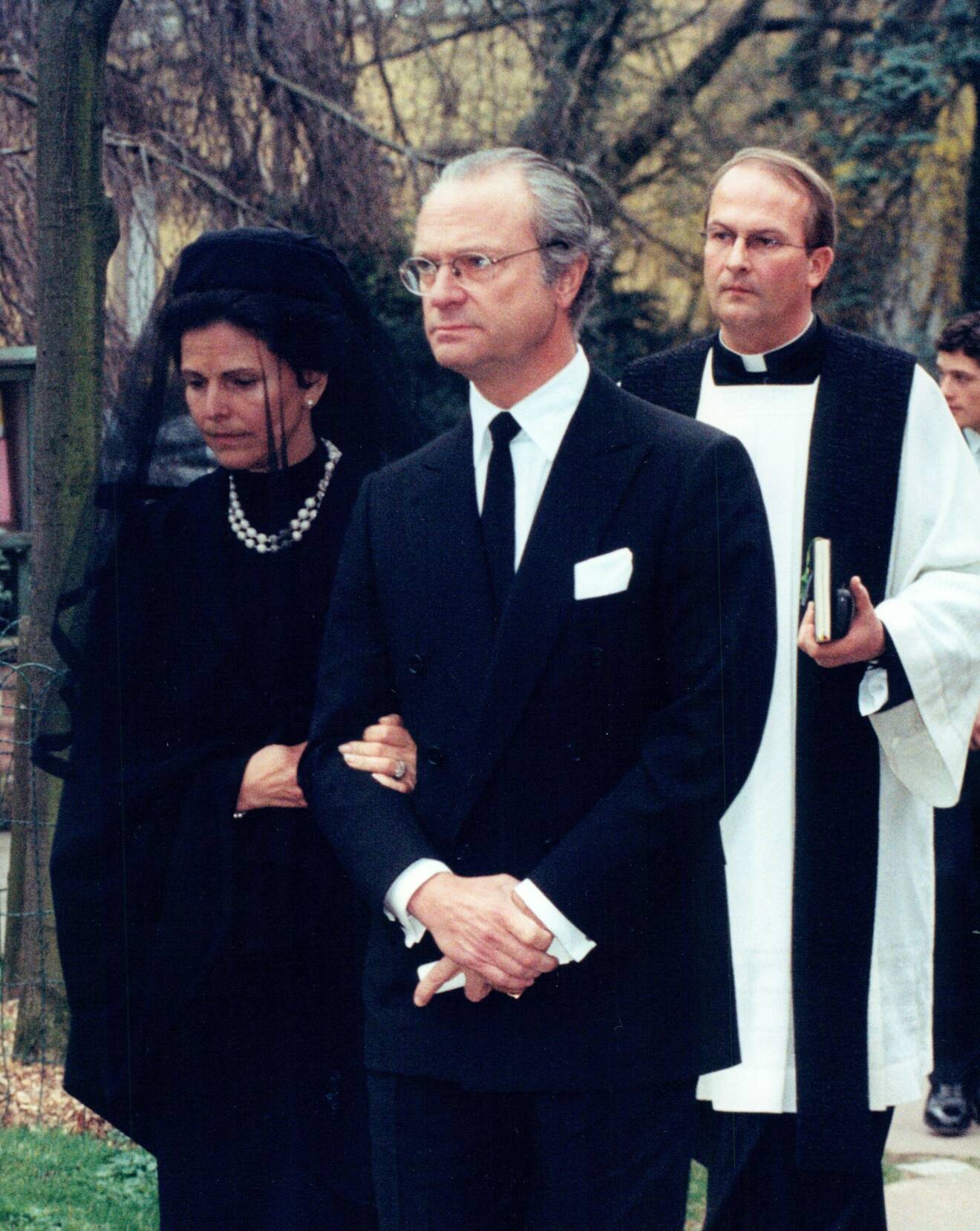 Drottning Silvia och kung Carl XVI Gustaf på begravningen av drottningens mamma, Alice de Toledo Sommerlath.