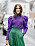 Nina Sandbech i färgstark outfit bestående av lila och grönt.