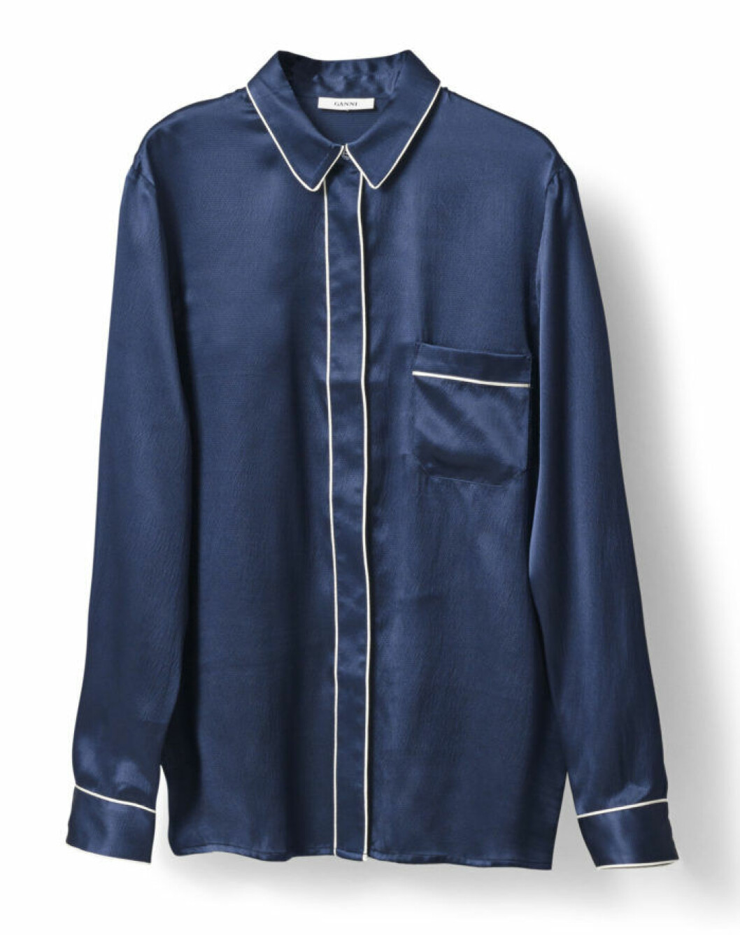 <a href="http://www.ganni.com/shop/shirts-and-blouses/fumiko-silk-shirt/F1373.html?dwvar_F1373_color=Iris#start=64" target="_blank">Pyjamasskjorta</a>, 2 049 kr, Ganni. pyjamasskjorta-ganni