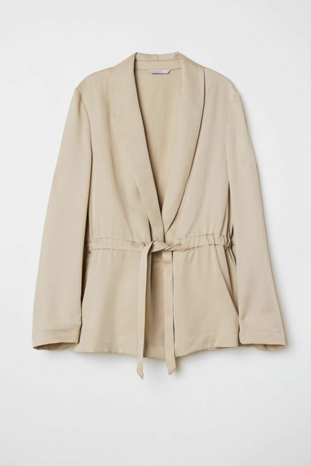 Beige kavaj med skärp i midjan från H&M