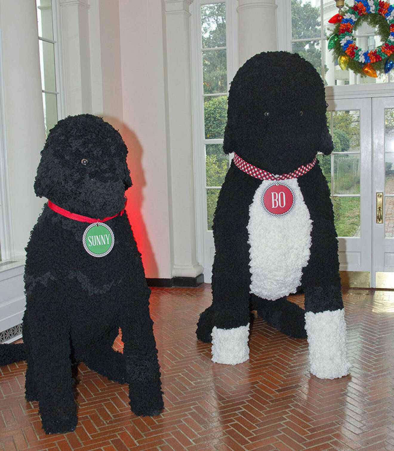 The 2016 White House Christmas decorations are previewed for the press at the White House in Washington, DC on Tuesday, November 29, 2016. Pictured are larger than life replicas of the Obama dogs Sunny and Bo, made of 25,000 yarn pom-poms. The first lady's office released the following statement to describe those decorations, "This year?s holiday theme, 'The Gift of the Holidays,' reflects on not only the joy of giving and receiving, but also the true gifts of life, such as service, friends and family, education, and good health, as we celebrate the holiday season." Credit: Ron Sachs / CNP /insight media