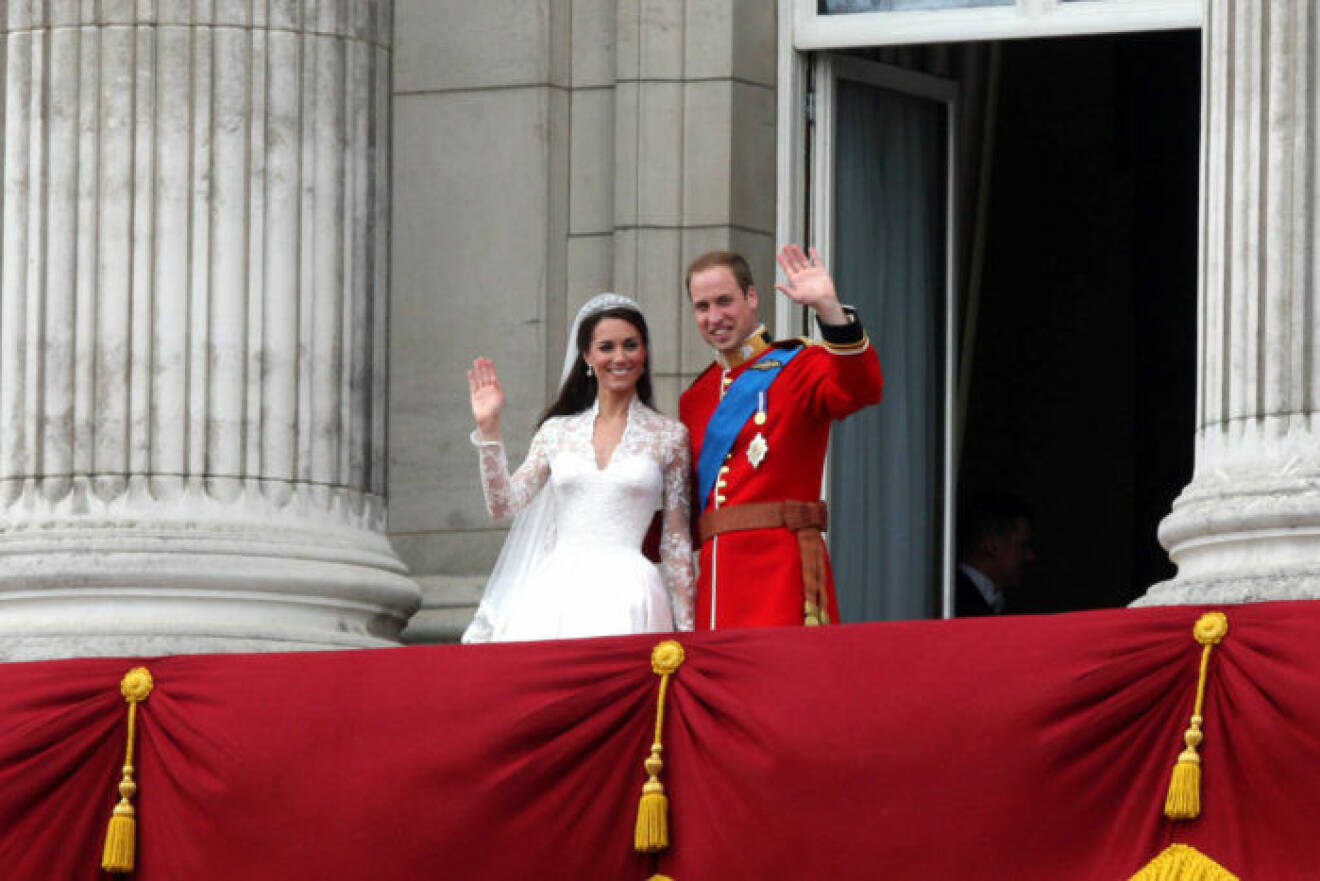 Duke and Duchess of Cambridge appear for the crowds on the balcony of Buckingham Palace after their wedding.