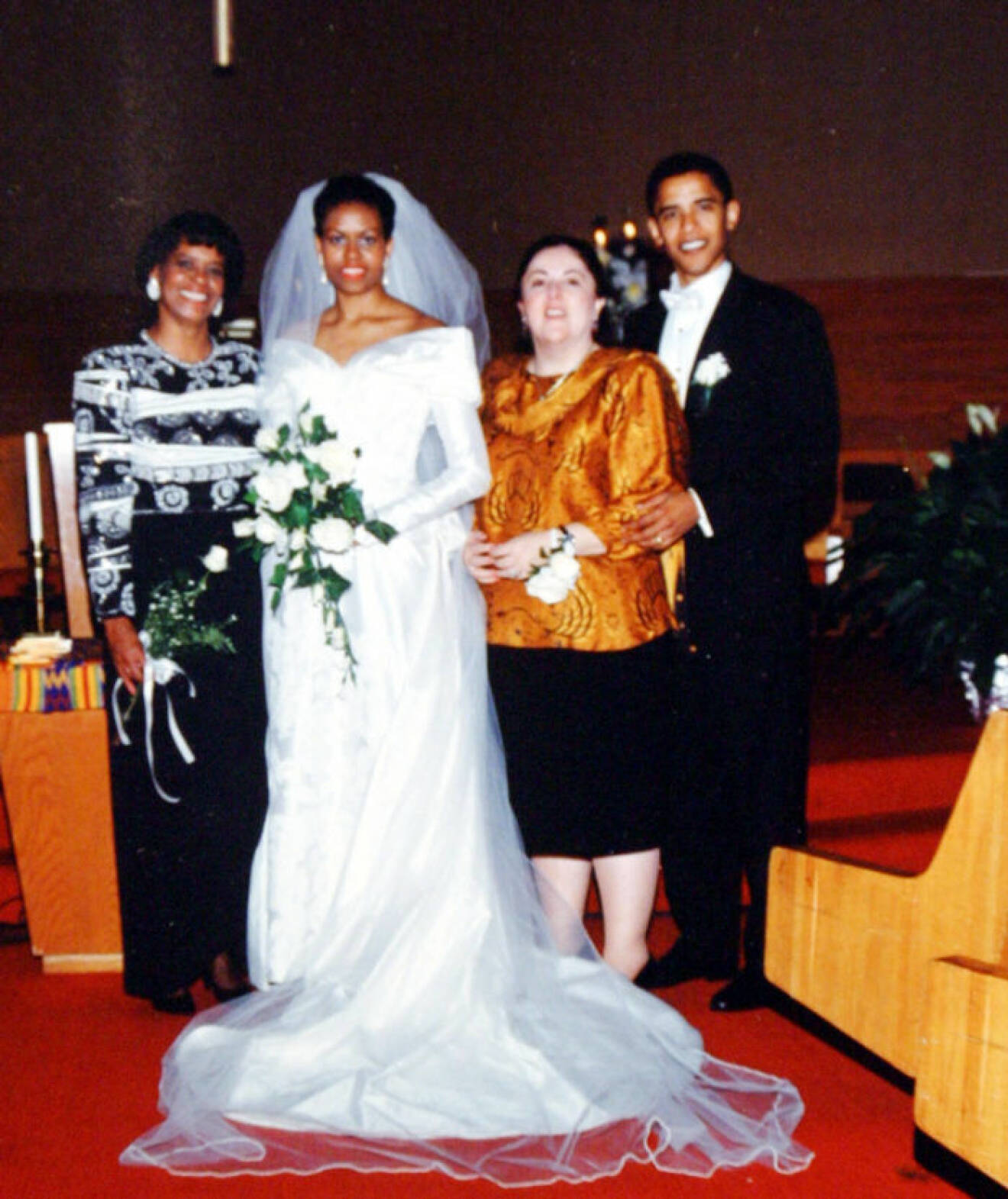 1992: Barack Obama and his wife Michelle Robinson Obama on their wedding day with Marian Robinson (L) and his mother Ann Dunham (second from right). Barack Hussein Obama (born August 4, 1961) is the junior U.S. Senator from Illinois. In November 2004, he was elected to the Senate as a Democrat. He is married to Michelle Obama and is a father to two daughters. On January 3, 2008 he came first in the Iowa caucus for the American presidency. (OfA/Polaris) /// Barack Obama and his wife Michelle Robinson Obama on their wedding day with Marian Robinson (L) and his mother Ann Dunham (second from right)