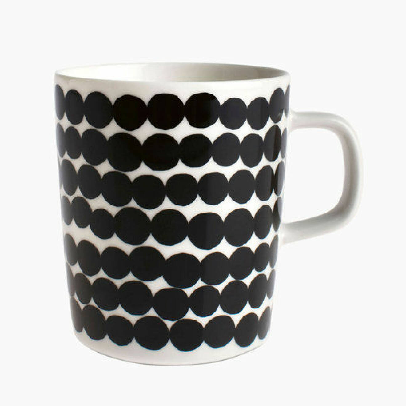 Kaffekopp, vit med svarta prickar på. Mugg från Marimekko.