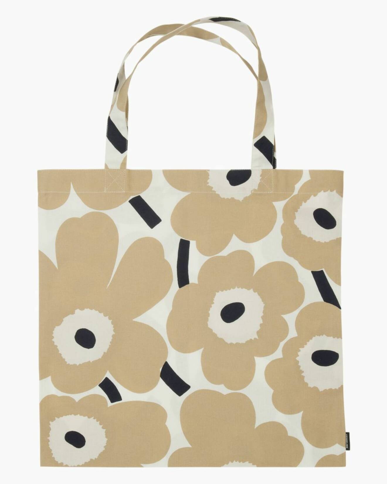 Tygväska med blommönster i beige och svart. Väska från Marimekko.