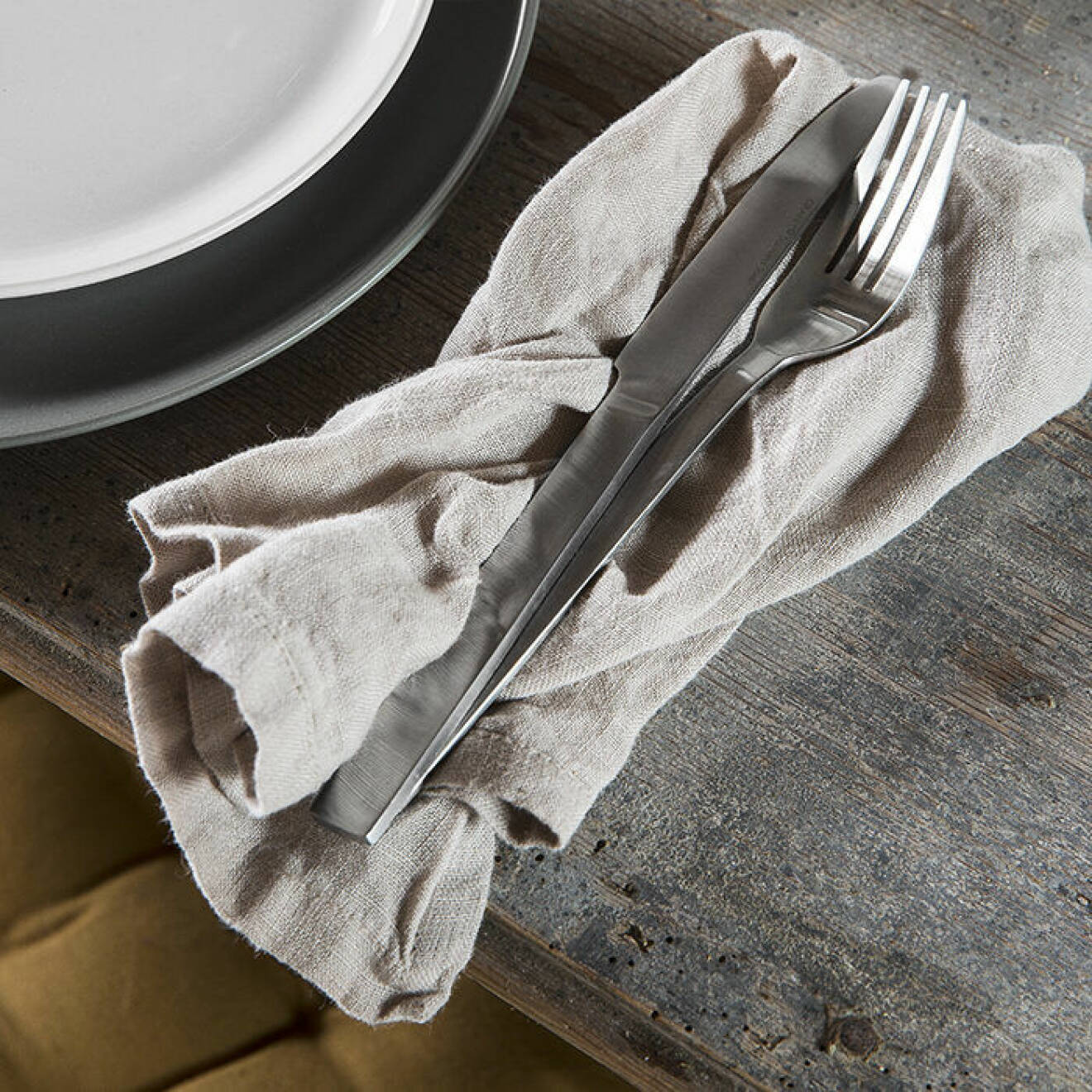 Detaljer i linne i köket ger en somrig känsla