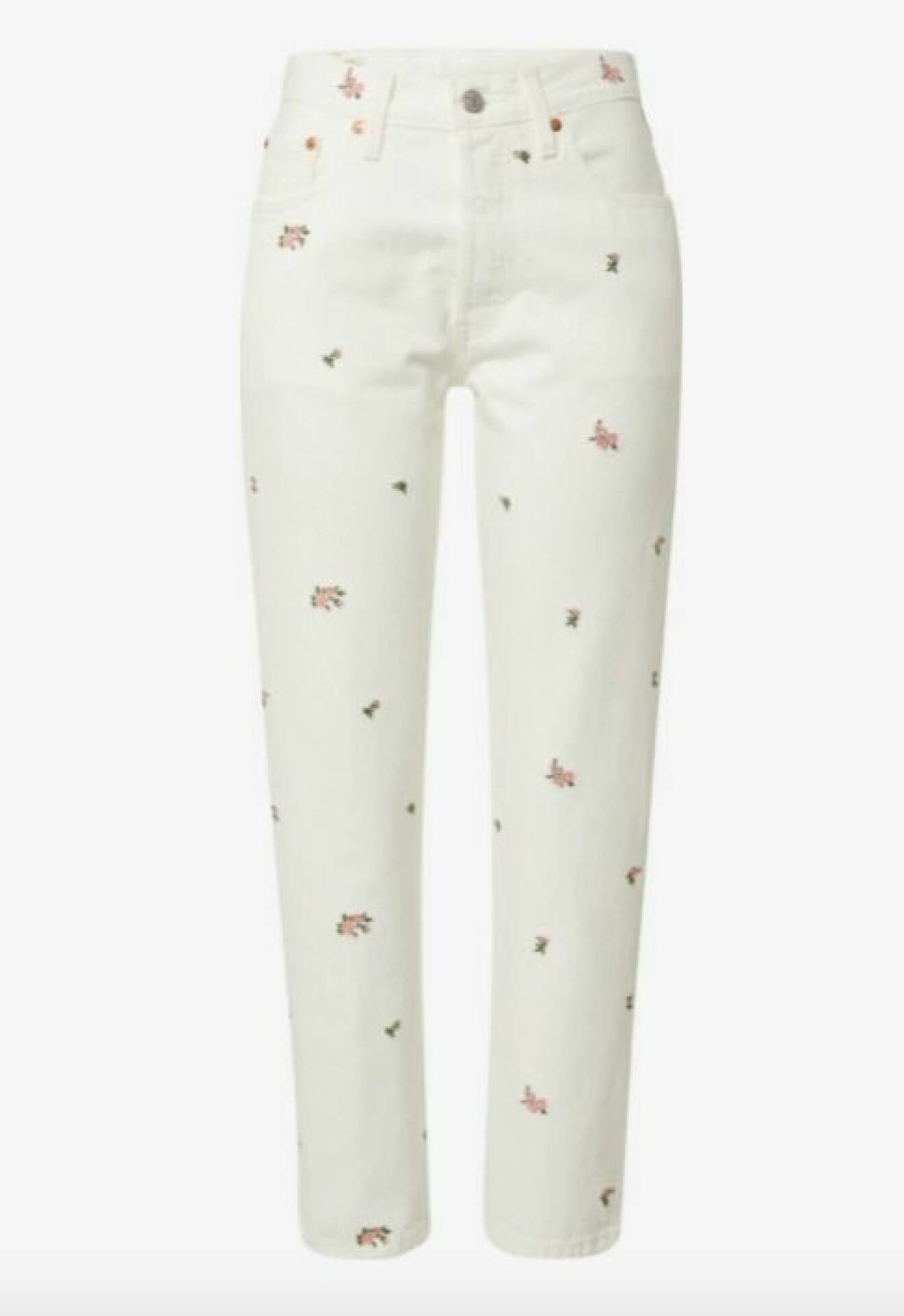 Vita mom-jeans med pastellfärgade blommor på. Jeans från Levis.