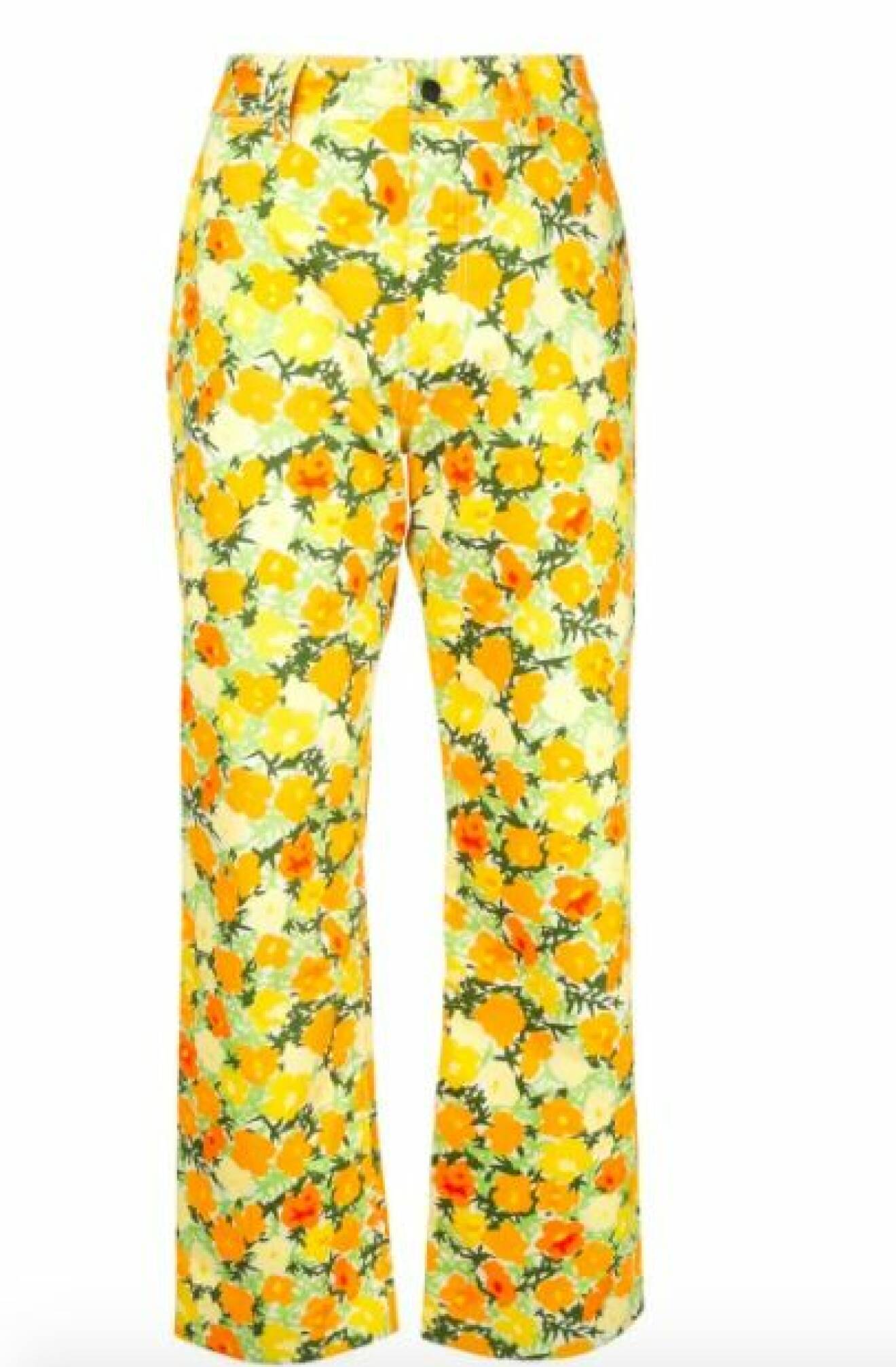 Blommiga jeans i gult och orange. Jeansen har hög midja och croppade, lätt utställda ben. Jeans från Simon Miller.