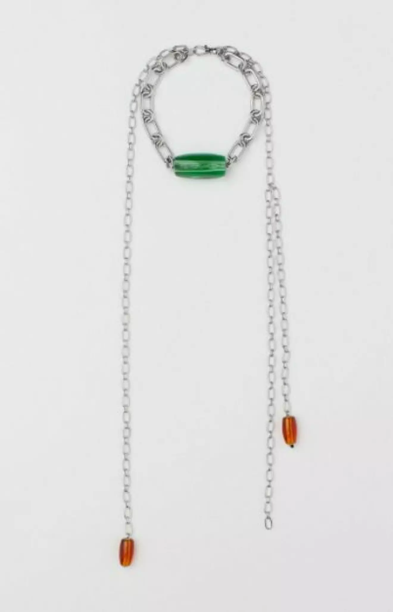 Silverfärgat halsband formad som kedjor med stenar. Halsband från H&amp;M.