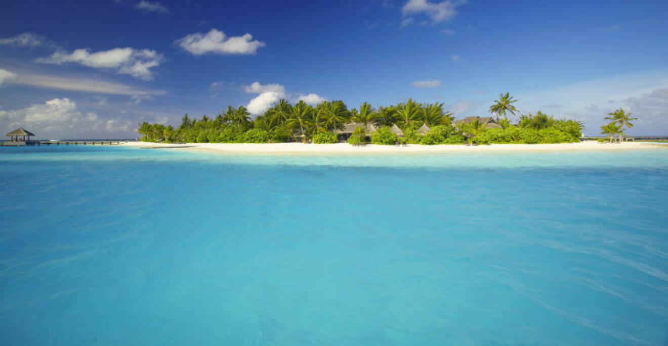 Exklusiva och avskilda Naladhu Island på Maldiverna