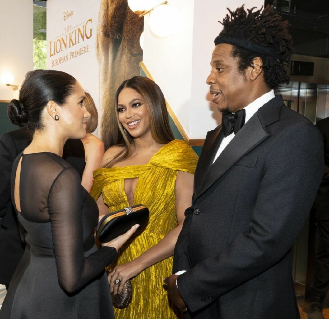 En bild på hertiginnan Meghan Markle, artisten Beyoncé och rapparen Jay-Z.