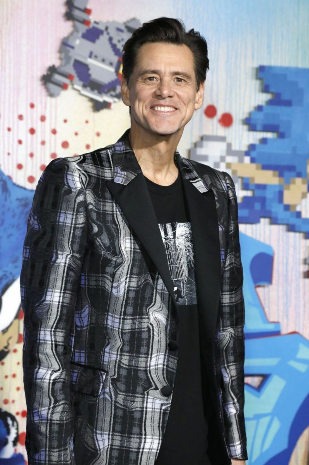 Jim Carrey innan karantän. Jim Carrey i rutor kostym