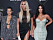 kim Khloé Kourtney Kardashian står bredvid varandra
