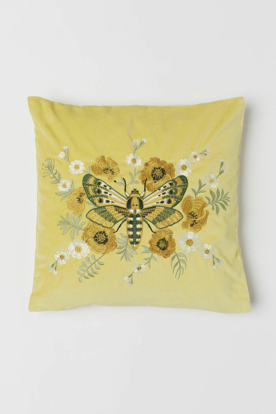 Gul kudde med fjäril från H&M home