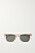 Ljusrosa, transparenta solgöasögon. Solglasögon från Lespecs finns på Netaporter.com