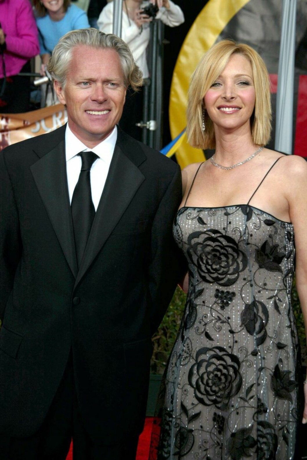 Lisa Kudrow med maken Michael Stern. Lisa Kudrow och Michael Stern ler