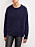Marinblå stickad tröja med rundad hals och långa ärmar. Fotad på modell. Tröja från By Malene Birger.