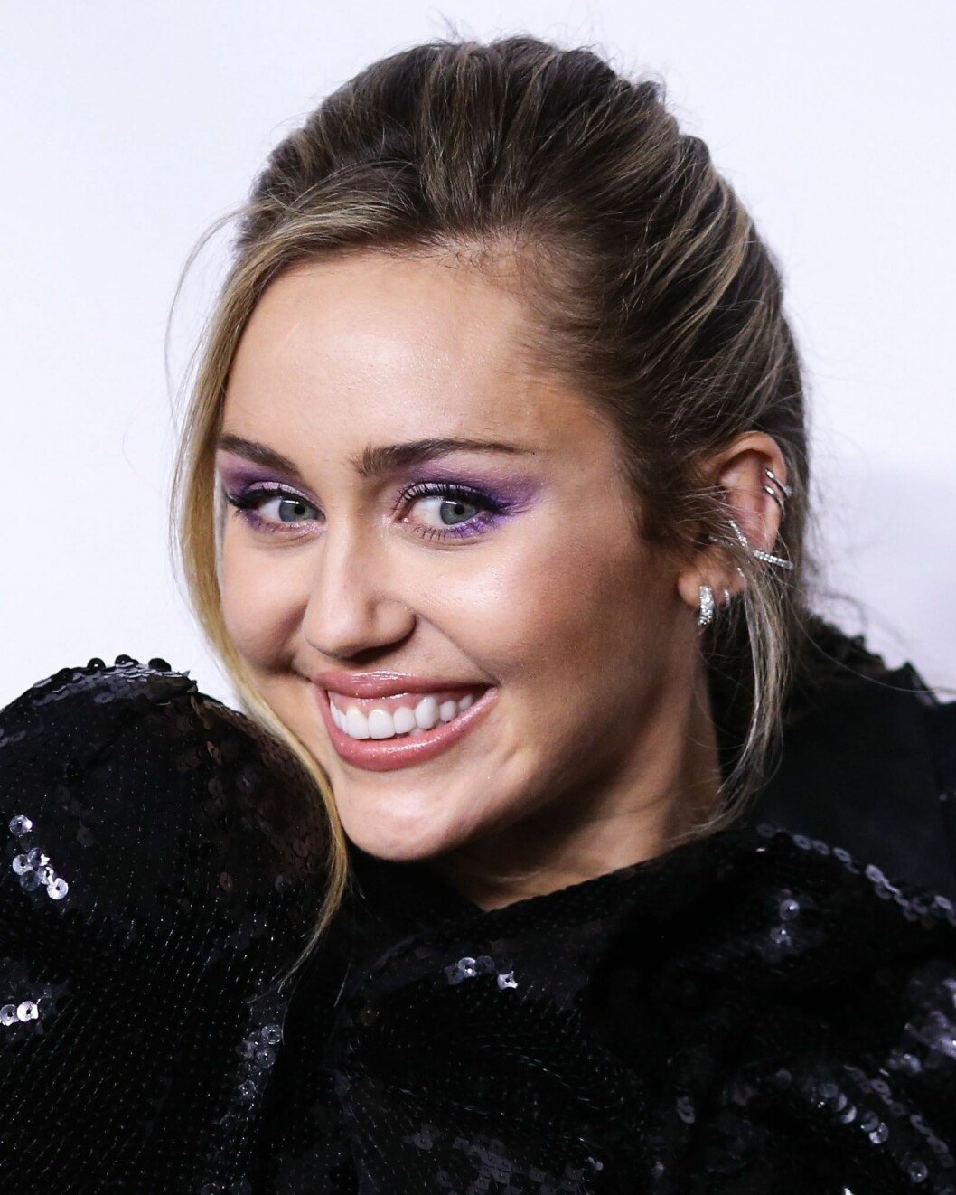 Det var sångerskans leende som gav henne smeknamnet Smiley, som sedan blev Miley. Miley Cyrus