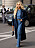 Emili Sindlev iklädd cargojeans och blå jeansskjorta under modeveckan i Paris.