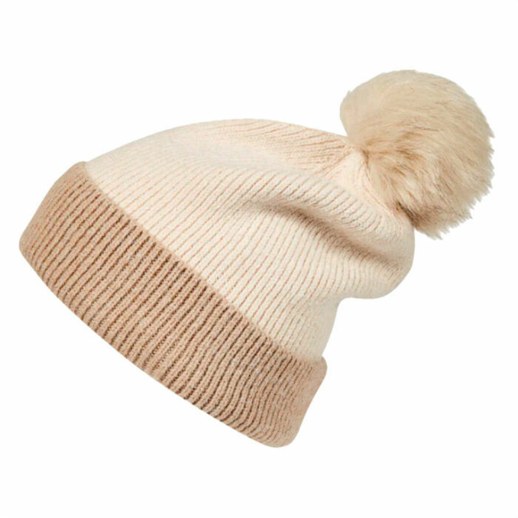 Beige mössa med tofs