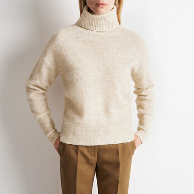 Offwhite stickad polotröja från Tiger of Sweden