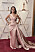 Mila Kunis på röda mattan vid Oscarsgalan 2022.