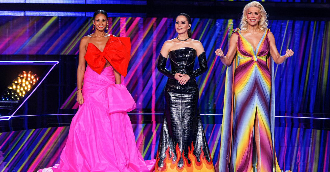 I tisdagens semifinal stod Alesha Dixon, Julia Sanina och Hanna Waddingham på scen. På lördag får de sällskap av Graham Norton. Eurovision song contests programledare Hanna Waddingham, Alesha Dixon och Julia Sanina.