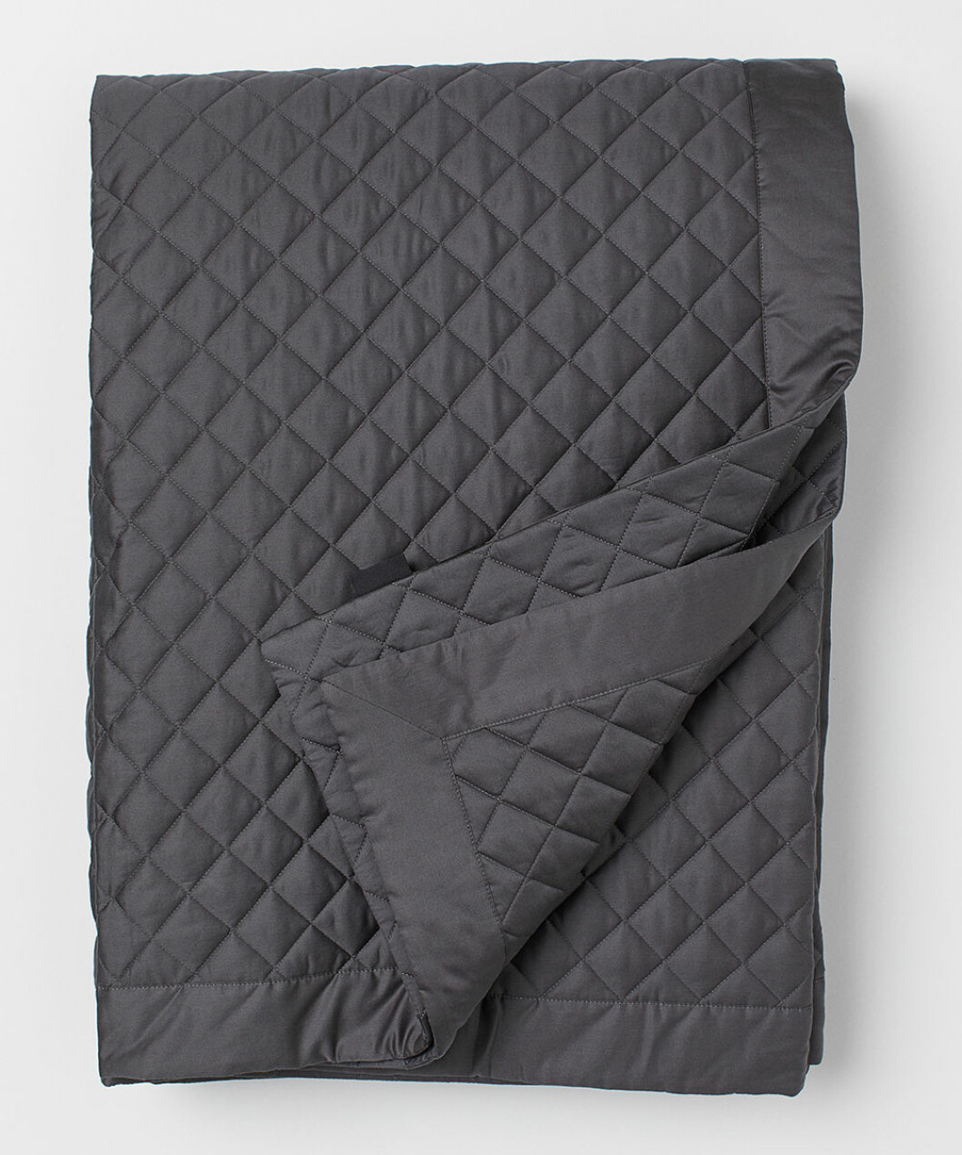 quiltat grått överkast från H&M Home