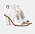 Vita sandaletter med hög, krökt klack. Sandalerna är i skinn med bred rem runt vristen. Sandaler med klack från Rodebjer.
