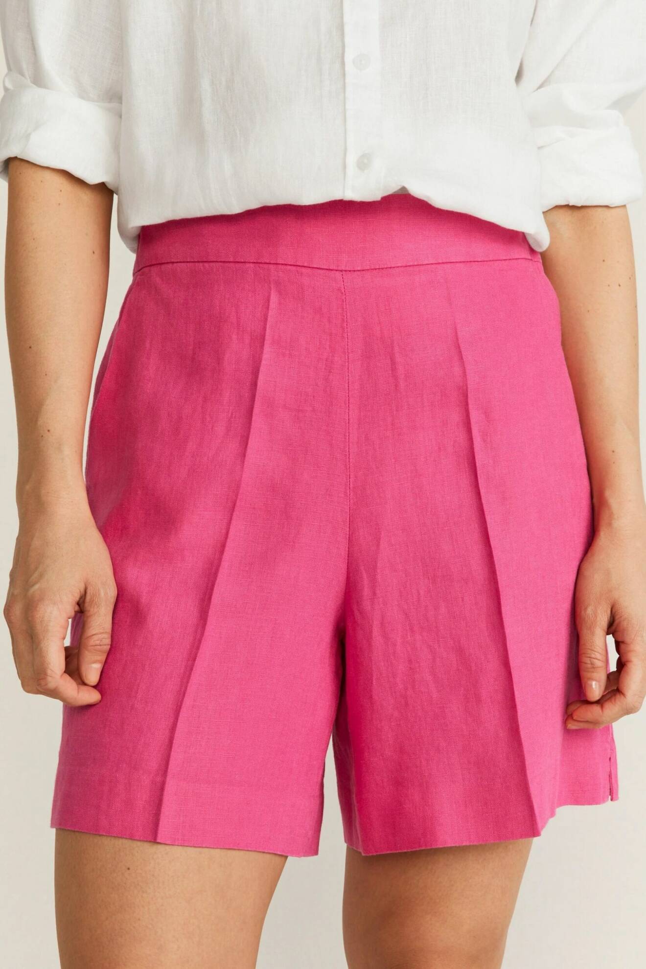 rosa shorts i linne med pressveck och vida ben för dam