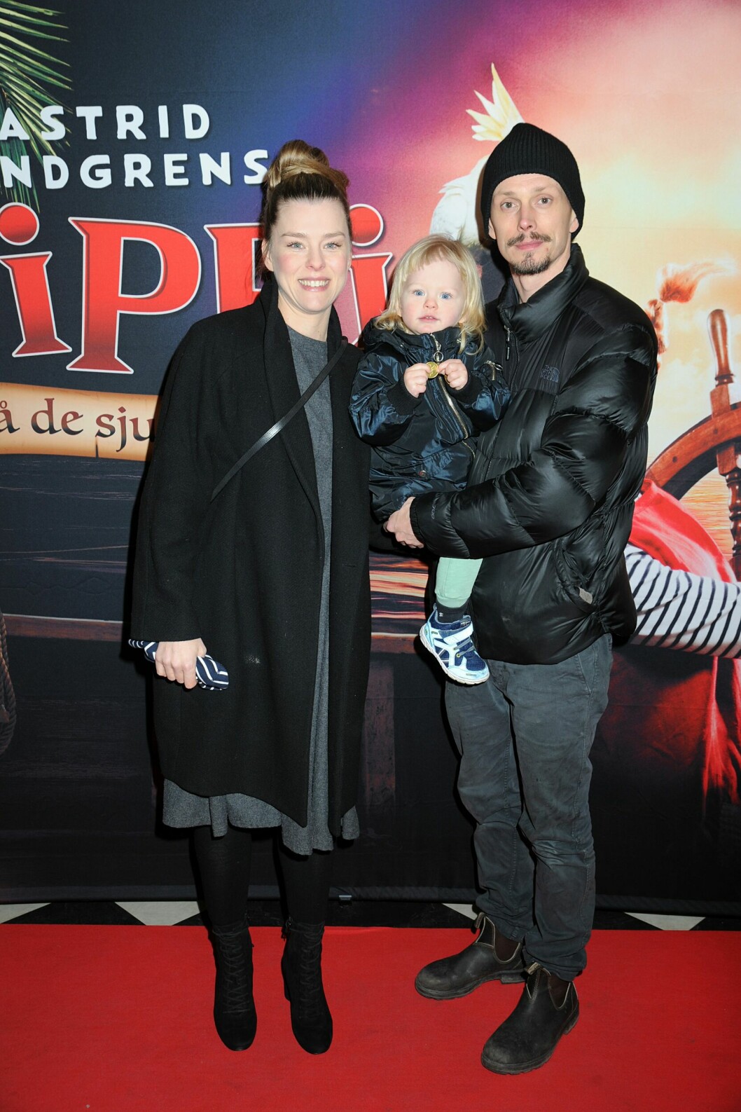 Sascha Zacharias med sin dotter och dotterns pappa.