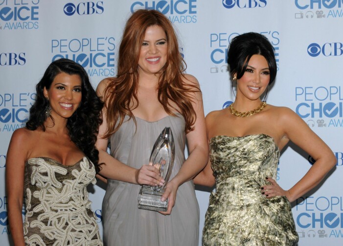 Khloe med systrarna Kourtney och Kim Kardashian 2011.