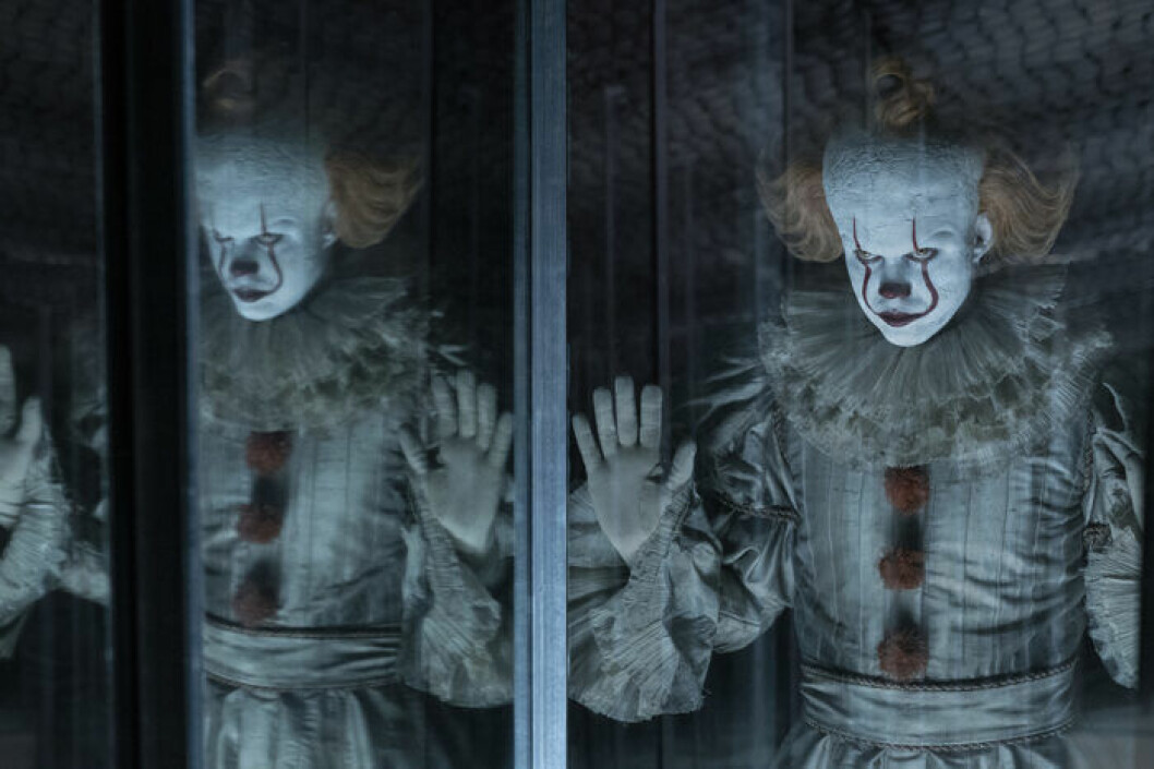 Bill Skarsgård som clownen Pennywise i filmatiseringen av Stephen Kings Det. Foto: TT Bill Skarsgård som clownen Pennywise i fimlen Det