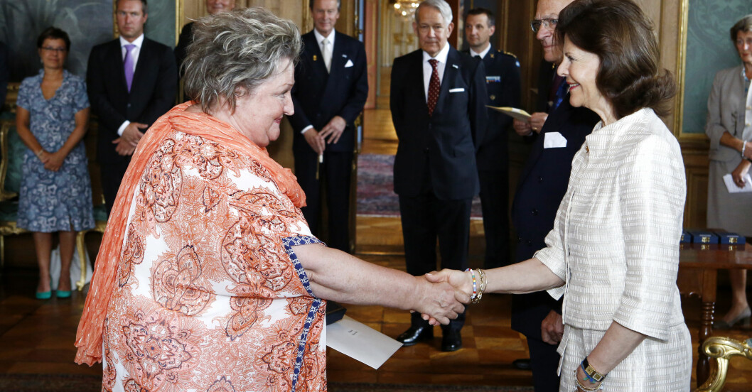 Marianne Mörck med kungen och drottningen.