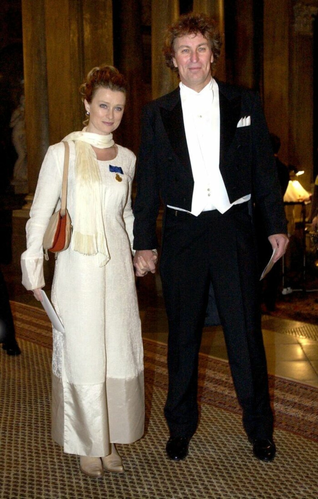 <span style="font-size: 16px;">På kungamiddag på Stockholms Slott 2003 med dåvarande maken Richard Hobert. </span>