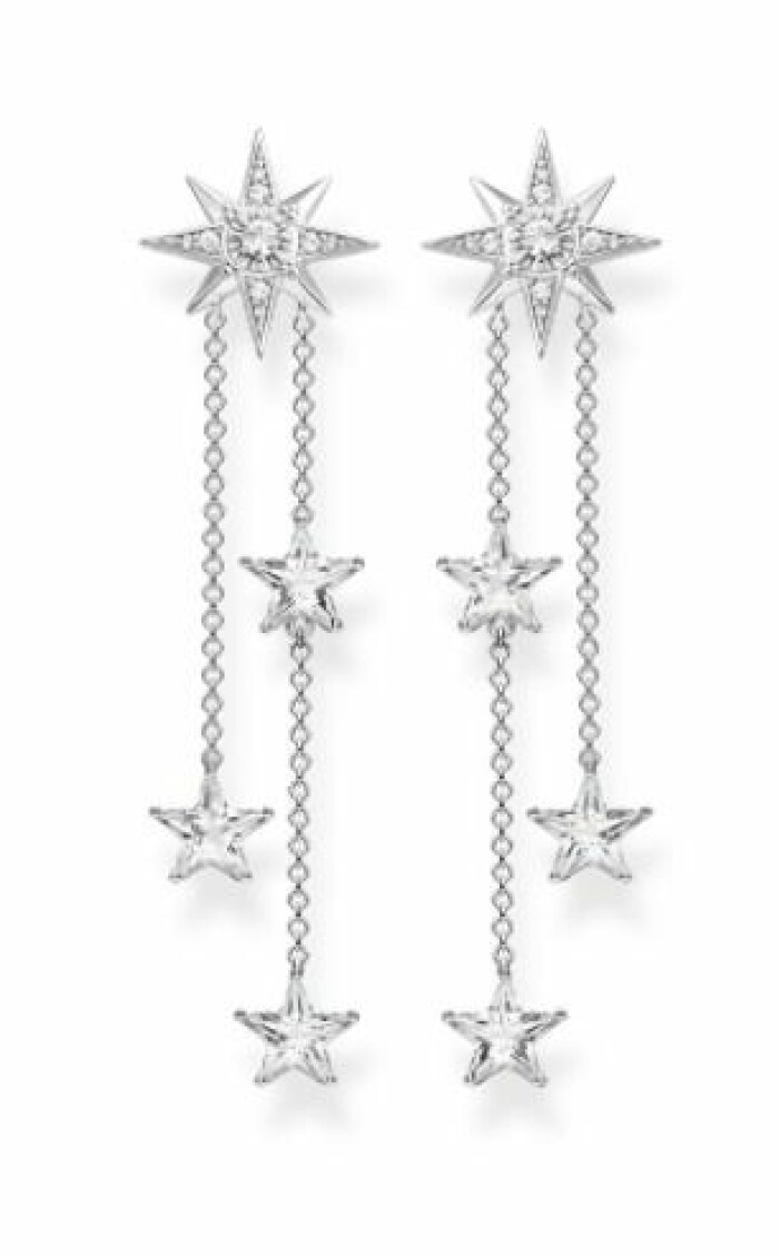 Örhängen, 1399 kr, Thomas Sabo. Dinglade, silverfärgade örhängen med stjärndetaljer och vit strass. Örhängen från Thomas Sabo.