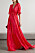 trend 2022: röd långklänning med släp från Carolina Herrera