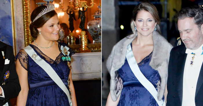 Kronprinsessan Victoria och prinsessan Madeleine i en blå spetsklänning.